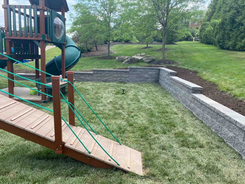 Retaining wall and sod installation